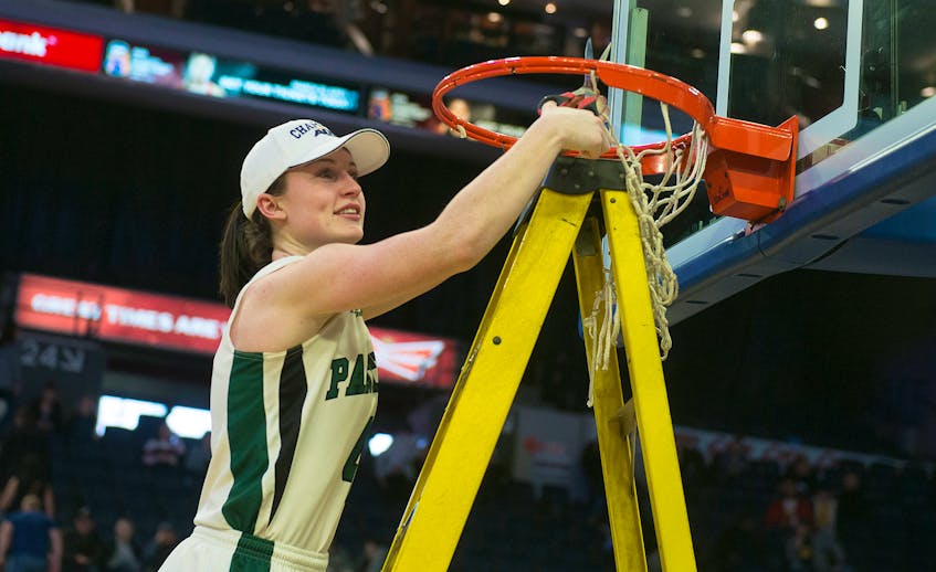 UPEI Panthers guard Jenna Mae Ellsworth cuts down the net following her team’s 78-59 victory over the Acadia Axewomen in the AUS Final 6 women’s basketball championship final Sunday at Scotiabank Centre.   RYAN TAPLIN The Chronicle Herald
