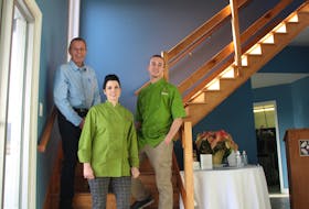 Neil Paterson, Krista LeTerte and Mark Paterson are shown at the entrance of the Dory Pub and Restaurant at the Dobson Yacht Club in Westmount. The eatery opened full-time at the yacht club in December. GREG MCNEIL/CAPE BRETON POST
