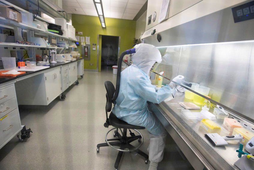  Scientists work in VIDO-InterVac’s (Vaccine and Infectious Disease Organization-International Vaccine Centre) containment level 3 laboratory, where the organization is currently researching a vaccine for novel coronavirus, at the University of Saskatchewan in Saskatoon, Saskatchewan, Canada October 18, 2019.
