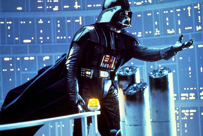 Darth Vader looks like he's about to reveal something surprising in The Empire Strikes Back.