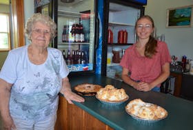 Farmers Family Diner co-owner Betty Hebb and waitress Michelle Meister with a variety of homemade pies. KIRK STARRATT