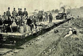 An open passenger car as part of the first train to cross the Grand Narrows Bridge. First Train Across Grand Narrows Bridge, ca 1890. CONTRIBUTED/77-847-981, Beaton Institute, CBU