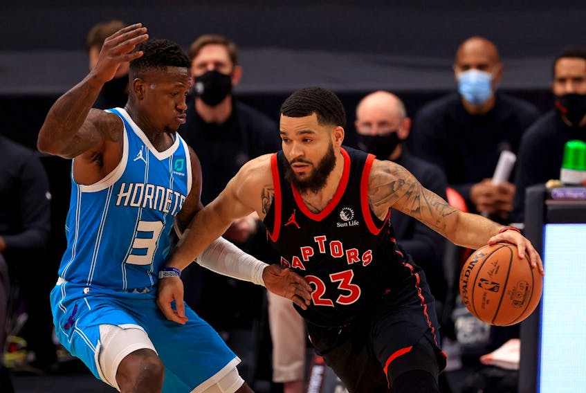 Fred VanVleet (right) drives on Terry Rozier during the Raptors' win over the Charlotte Hornets on Saturday night. It was Toronto's second win in a row.
