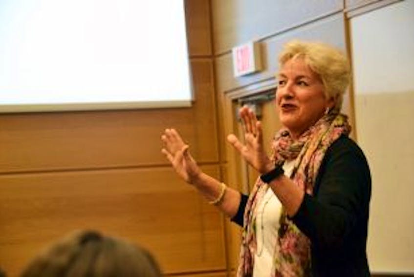 ['Annette Verschuren, chair and CEO of energy storage solutions company NRStor Inc., speaks with students at Cape Breton University last Thursday about what it takes to be successful in the corporate world. Verschuren, originally from North Sydney, is the former president of The Home Depot Canada and Asia.']