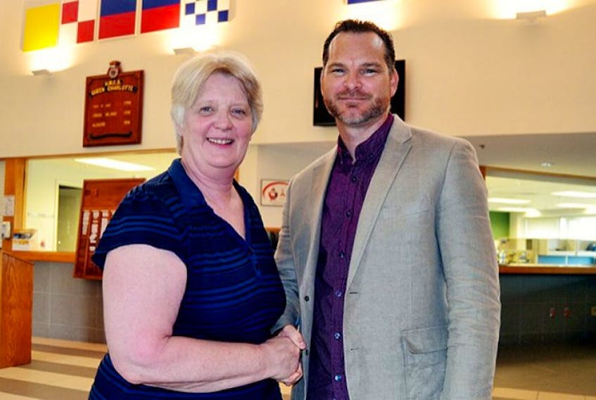 Donna Earl, executive director, P.E.I. Military Family Resource Centre, welcomes Doug Allen, operations and recruitment co-ordinator for the Atlantic Region’s Veterans Transition Network, who presented an information session at HMCS Queen Charlotte Friday.