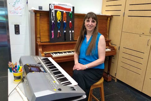 Long-time Kings County music educator Donna Rhodenizer retires this month from a 35-year teaching career. Rhodenzer, shown here in her classroom at KCA in Kentville, plans to keep busy writing and arranging music and performing as part of the duo Donna & Andy.