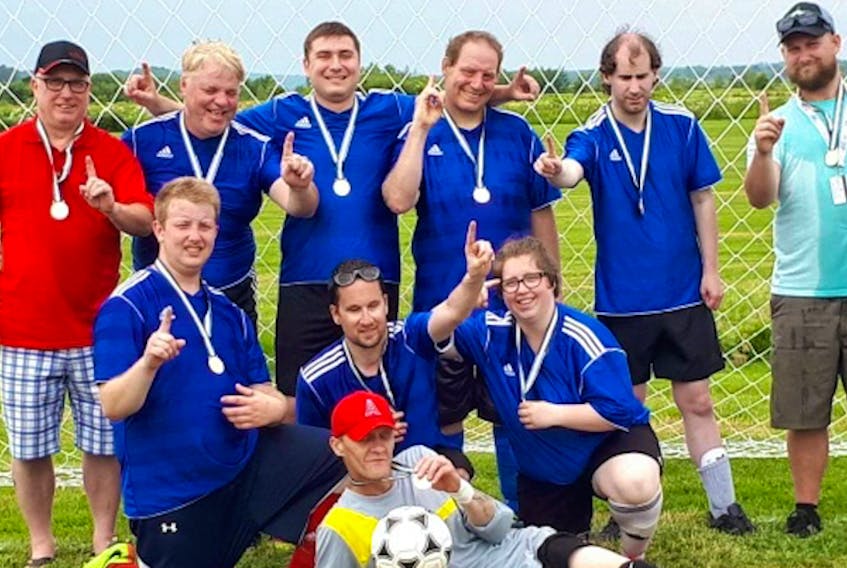 Scott Weir, second from the right standing, scored a goal in his first Summer Games for Special Olympics as a soccer player. His team, from Kings Special Olympics, won the gold medal.