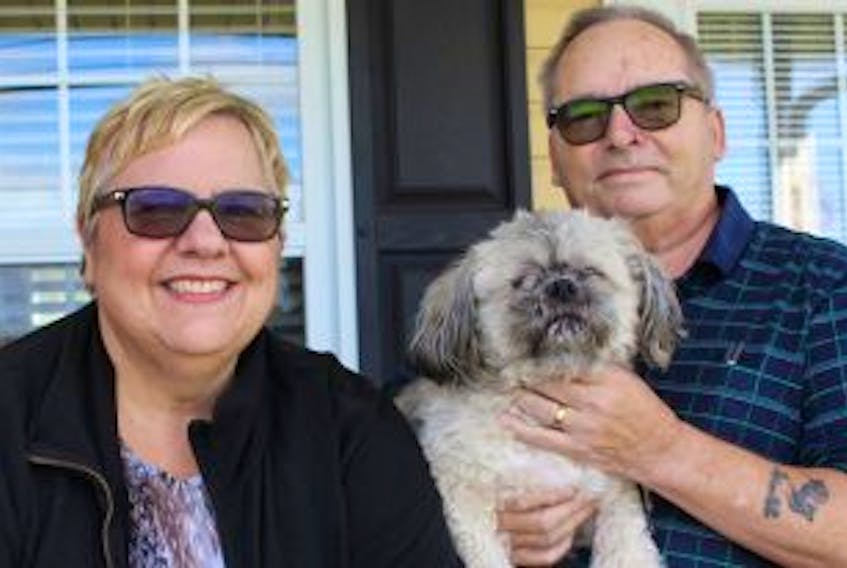 ['<p>Vicki Homes with her husband, Dan, and their dog Monty outside their house in Summerside. Homes suffered a traumatic brain injury over four years ago. Now she wants to start a support group for people with similar experiences.</p>\n<p>&nbsp;</p>']