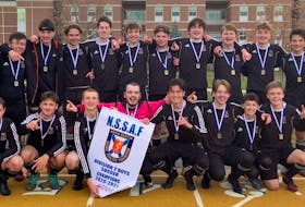 The Breton Education Centre Bears boys soccer team captured their first Nova Scotia School Athletic Federation Division 2 soccer provincial championship in 13 years over the weekend, defeating École Secondaire du Sommet of Bedford 6-5 in penalty kicks. Members of the team are shown following the win. From left, front, Hayden Forward, Hayden Desrosiers, Carter Brown, Evan Campbell, Conor Chiasson, Drew Baldwin, Derek Loro and Owen Flectcher; back, Richie Wilcox (coach), Brandon Caudle (coach), Brenden Fraser, Jeremy O’Quinn, Brett Baxter, Jack Cashen, Ben Kearney, Waylor Petrie, Ethan MacNeil, Dylan McSween, Luke MacKinnon, Morgan Hillier, Bret Baxter (coach) and Lacey Bursey (coach). CONTRIBUTED