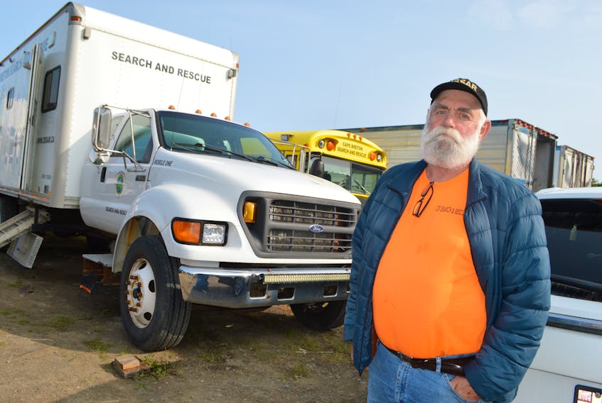 Paul Vienneau, a search manager with Cape Breton Search and Rescue, on the A&P Transmission's lot in Gardiner Mines, where the search group keeps several vehicles. Vienneau said the group has been around for 51 years and has never had a permanent home for vehicles or a pre-search organization site. Vienneau said they are hoping someone can help. Sharon Montgomery-Dupe • Cape Breton Post