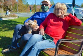 Marg McIntyre and her husband Jim McIntyre of Glace Bay relax with their dog Brutus, after Marg finished dialysis treatment at the Cape Breton Regional Hospital in Sydney on Friday. Marg said having the Tom Peach Renal Dialysis Clinic opening up at the Glace Bay Hospital so close to home will be life-changing. Sharon Montgomery-Dupe/Cape Breton Post
