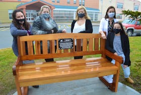 Teachers at Oceanview Education Centre in Glace Bay including from left, Tina Kennedy-Lohnes, guidance counsellor, Diane McNeil, Rose Abraham, April Parsons, and Grade 8 student Jaime Paige Parsons, reflect by a bench which will be dedicated to the late Leigh-Anne Cox, a former student at the school, during a ceremony at the school today. Leigh-Anne, who died in June after a courageous battle with cancer, inspired so many people at the school the teachers formed a ‘Bee Kind’ committee and built a little park to carry on the kindness and compassion for others she was noted for, on at the school forever. Sharon Montgomery-Dupe/Cape Breton Post