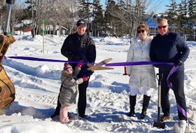 A ceremonial ribbon cutting was held last week at the Inverary Resort in Baddeck where a new main lodge will be constructed. Shown, from the left, are Matthew MacAulay, the resort operations manager, his daughter Lennie MacAulay, Amanda Mombourquette, executive director of the Strait Area Chamber of Commerce, and resort owner Scott MacAulay. CONTRIBUTED 