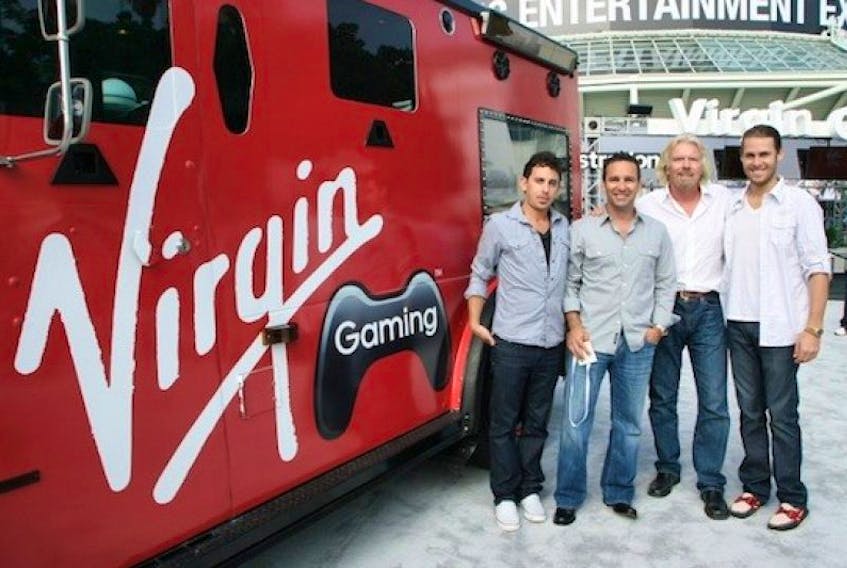 <p>Virgin Gaming opens an office in Charlottetown. Company officials are seen here with Virgin founder, Sir Richard Branson. Pictured from left to right, Bill Levy (President, Co- founder), Rob Segal (CEO), Sir Richard Branson and Zack Zeldin (VP Game Operations, Co-founder).</p>