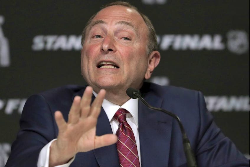 In this May 27, 2019, file photo, NHL Commissioner Gary Bettman speaks to the media before Game 1 of the NHL hockey Stanley Cup Finals.
