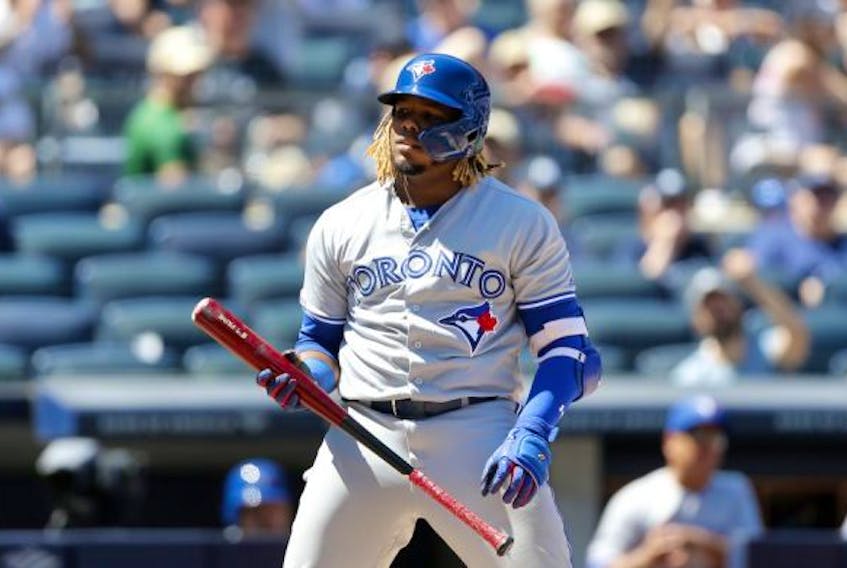 Vladimir Guerrero at-bat earlier this season. The team's star third baseman will be day-to-day due to knee inflammation. Jack Boland/Toronto Sun