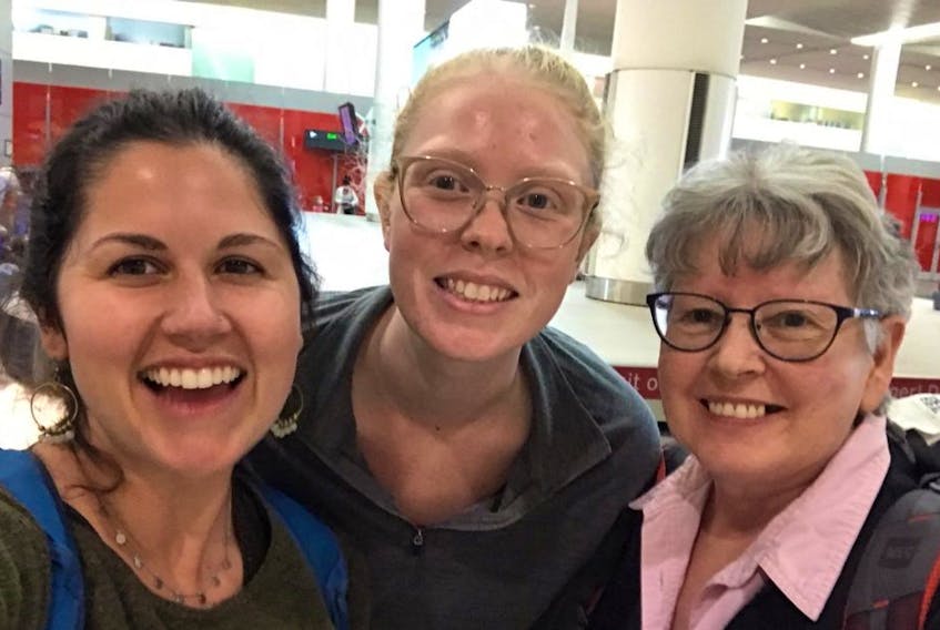 From left, Breaking the Silence Network volunteers Indigo Christ of Halifax, Laura Robinson of Rothesay, N.B., and Lenora Yarkie of Edmonton at Pearson International Airport in Toronto on Monday. Contributed
