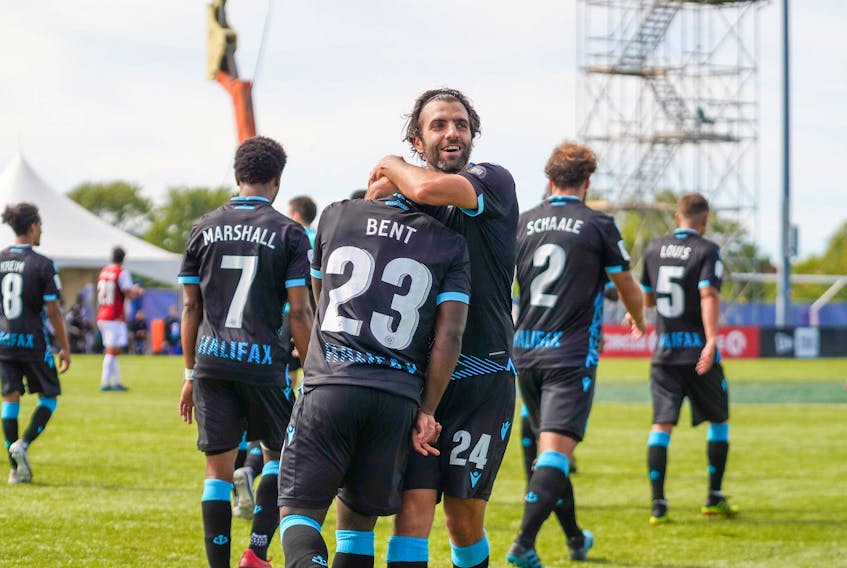 Alex De Carolis and Cory Bent celebrate Wednesday's 2-0 victoy over Valour FC in Charlottetown. Both players scored their first-ever goals for HFX Wanderers FC in the win. (CANADIAN PREMIER LEAGUE)
