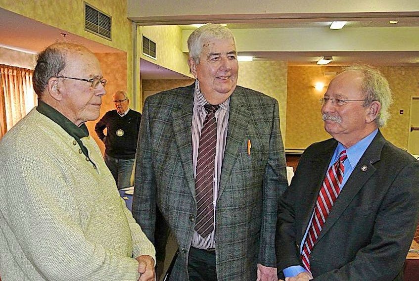 Amherst Rotarian Don Russell (left) speaks to Cumberland County Warden Allison Gillis (centre) and Amherst Mayor Dr. David Kogon following Monday’s Rotary meeting.

