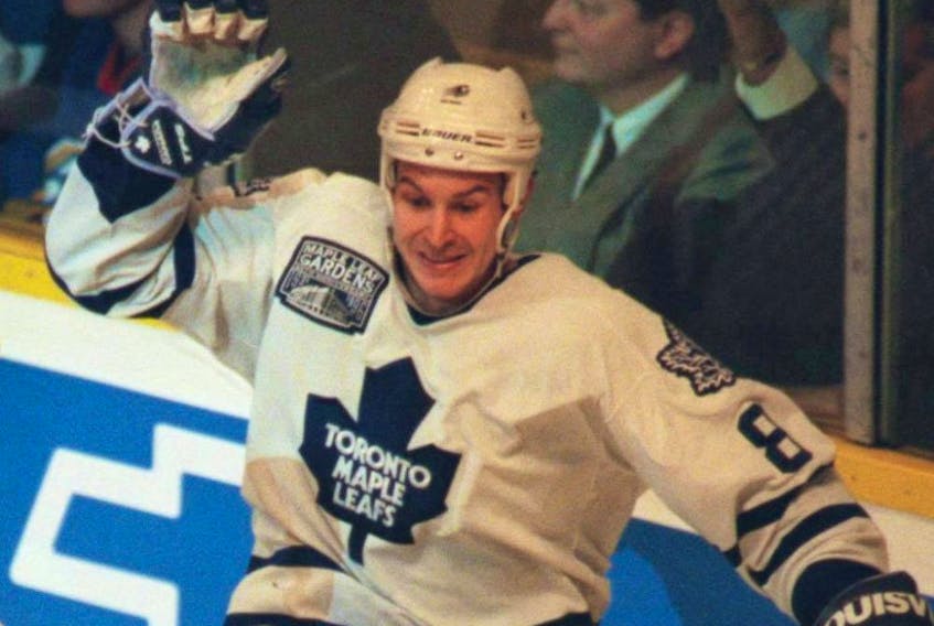 Toronto Maple Leaf's Mats Sundin celebrates with Todd Warriner following Warriner's goal against the Dallas Stars.