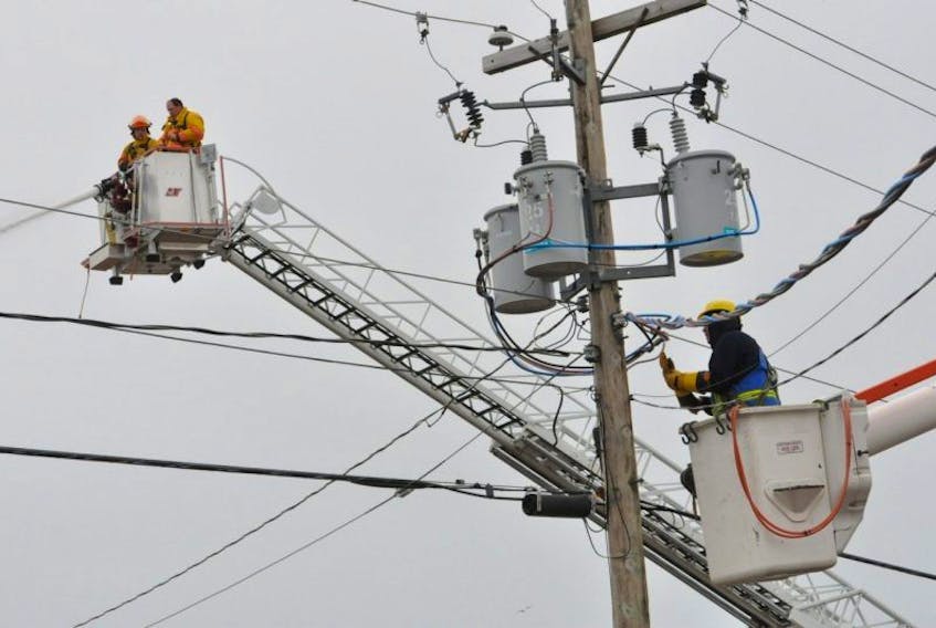 Nova Scotia Power is on the scene, cutting power to the immediate area. TINA COMEAU PHOTO