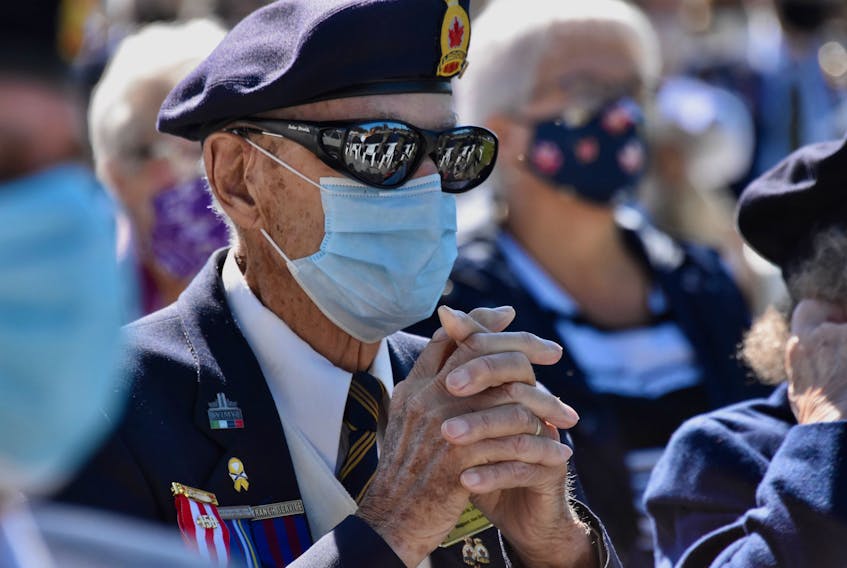 96-year-old Second World War veteran Roland Bouque sits masked during a Sept. 12 ceremony in Yarmouth County, organized by the Wedgeport Legion Branch 155 to recognize the 75th anniversaries of the Liberation of the Netherlands and VE-Day, which were marked in May. COVID-19 restrictions at the time didn't allow the Legion to properly recognize these anniversaries or their veteran members. TINA COMEAU PHOTO