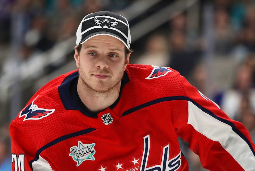 Washington Capitals stars defenceman John Carlson is among those players who think the only fair way to cement playoff spots would be to finish the regular season, if possible.  (Ezra Shaw/Getty Images)