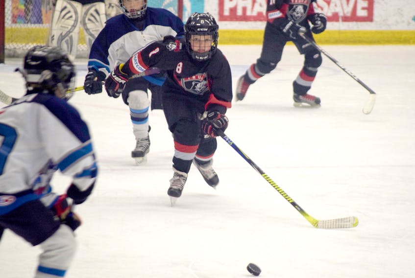 Cole Pugsley of the Truro Bearcats chases down a puck during the provincial atom A final at the Hockey Nova Scotia Day of Champions on April 13.