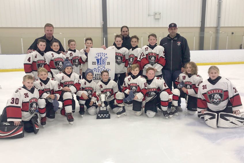 Members of the gold medal-winning Superline Fuels Bearcats are, first row, from left, Braisyn Watts, Konnor McNutt, Nicholas Burcham, Cameron Isenor, Austin Hoyt, Carter Worr, Cameron Delahunt, Maxim Munroe and Amy Field; second row, Griffin MacEachern, Ryan Jollimore, David Perrin, Rigby VanTassell, Tyler Sullivan, Rylan Patriquin and Ethan Normore; third row, coaches Jeff Sullivan, Brookes VanTassell and Jason Hoyt. Missing is Cole Pugsley. CONTRIBUTED
