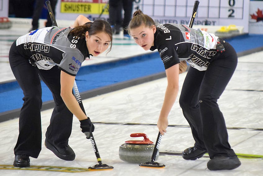 Karlee Burgess, left, and Lindsey Burgess, shown here during the Pinty’s Masters Grand Slam of Curling in Truro last fall, will represent Nova Scotia at the Canadian junior championship Jan. 19 to 27 in Prince Albert, Sask. The Colchester County cousins are members of the reigning national champion Kaitlyn Jones rink.