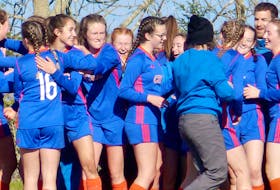 The CEC Cougars celebrate after winning the NSSAF Division 1 girls soccer title Saturday.