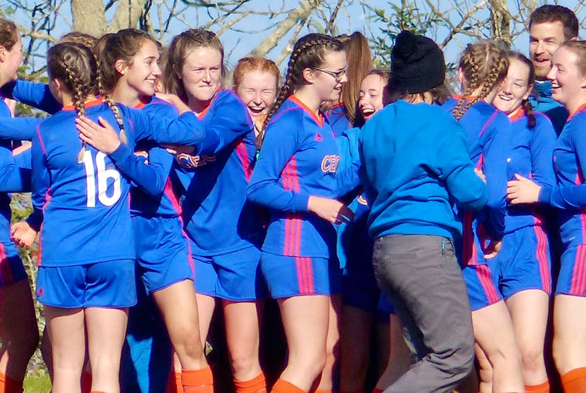 The CEC Cougars celebrate after winning the NSSAF Division 1 girls soccer title Saturday.