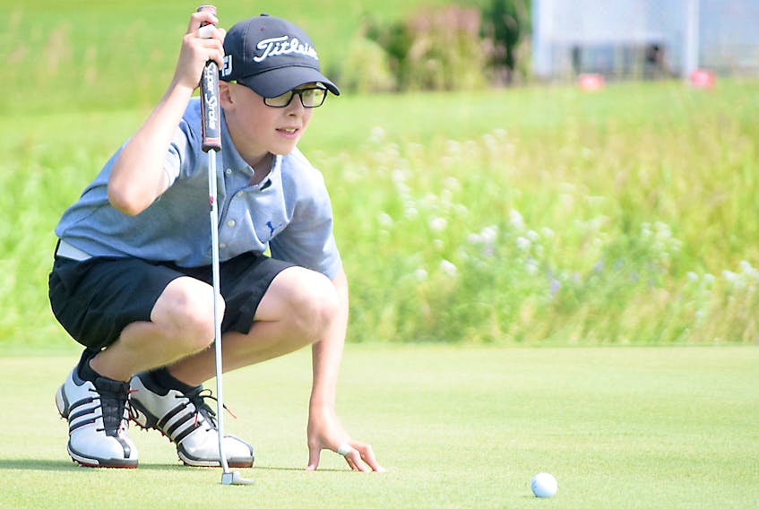 Truro’s Zach Gaudet eyes up a putt during the final round of the NSGA peewee boys championship on Wednesday. Zach fired a two-day total of 8-over-par 152 to win the title.