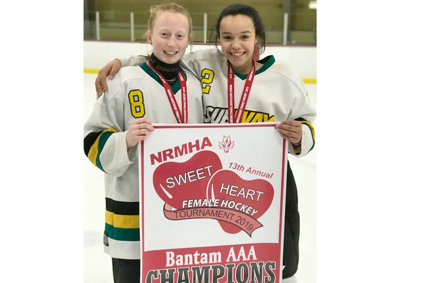 Baillie Griffon, left, and Willa Evans played a big role for the Fundy Highland Subway Selects during the Sweetheart bantam AAA female hockey tournament on P.E.I. The Selects rolled through the tournament with an undefeated 5-0 record.