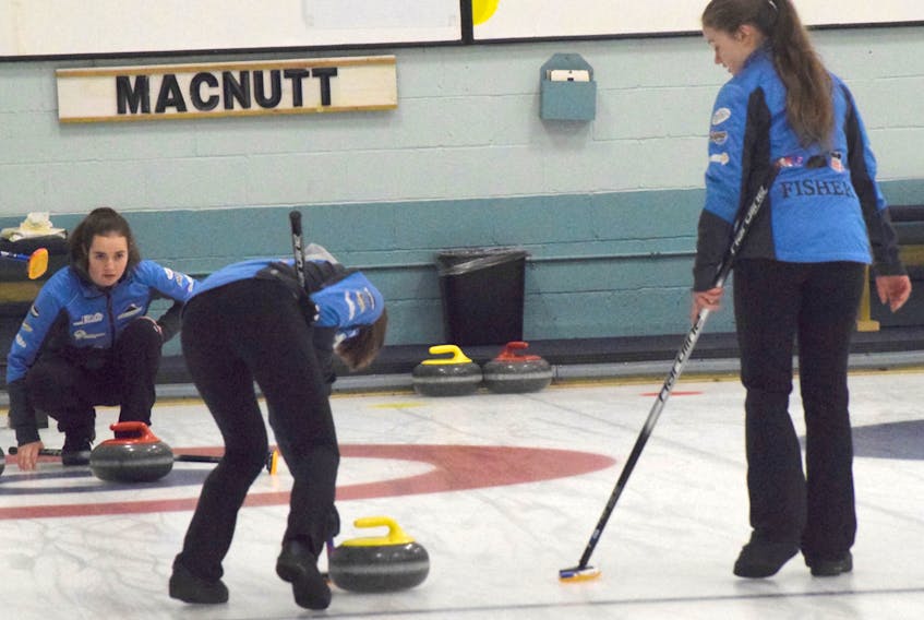 Ally MacNutt keeps a close eye on the stone while third Anna Varga sweeps, with second Cerys Fisher ready to jump in. MacNutt is skipping one of two Truro girls teams at the Nova Scotia under-18 championship this weekend at Truro Curling Club. Bryce Doiron