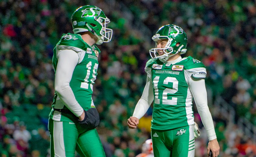 Brett Lauther, right, of the Saskatchewan Roughriders, was honoured this week as a CFLPA all-star and a CFL West Division all-star. Liam Richards/Electric Umbrella