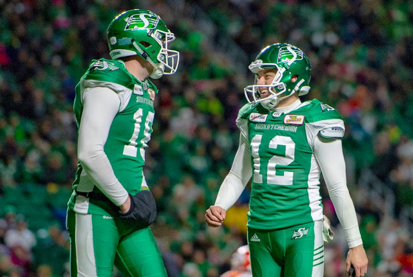 Brett Lauther, right, of the Saskatchewan Roughriders, was honoured this week as a CFLPA all-star and a CFL West Division all-star. Liam Richards/Electric Umbrella
