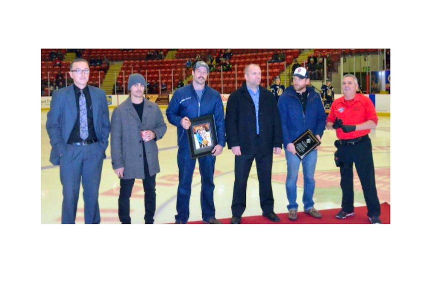 Steve Lindsay, right, is honoured in Truro for his 1,000th game with the Bearcats. He’s joined by, from left, Bearcats head coach/GM Shawn Evans, and former Bearcats Colby Lanceleve, Travis Moore, Jim Barbour, and Glen Frazee. Jim Webb photo