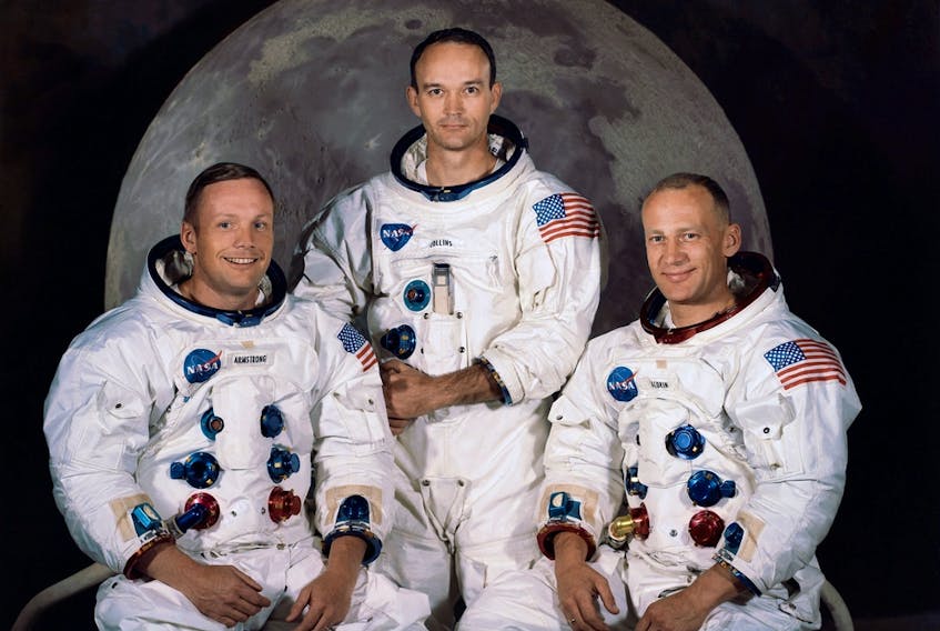  In this file photo obtained from NASA, shows the official crew portrait of the Apollo 11 astronauts taken at the Kennedy Space Center on March 30, 1969, of(L-R) Neil A. Armstrong, Commander; Michael Collins, Module Pilot; and Edwin E. “Buzz” Aldrin, Lunar Module Pilot.
