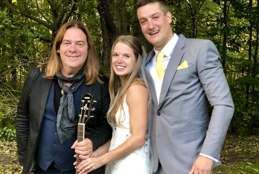 (L-R) Alan Doyle, Dana McKinlay and Stewart Dowd on the couple's wedding night, Sept. 15, 2019. 