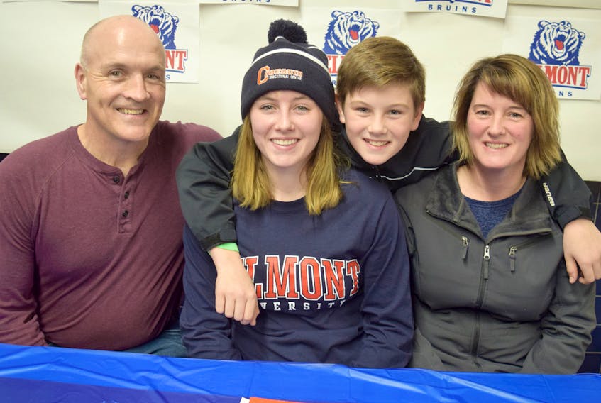 Maddie Quinn is thrilled to be pursuing a college education south of the border. Quinn will attend Belmont University in Nashville where she will work toward a nursing degree and throw javelin for the Bruins track and field team. A letter of intent signing event was held recently at CEC. With Maddie are her parents Paul, Natasha Fraser and brother Logan.
