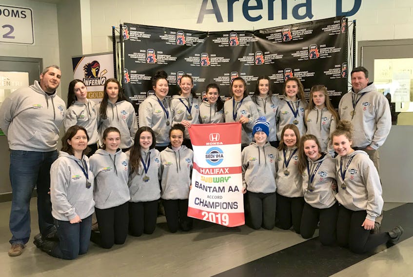 The Fundy Highland Bantam AA Subway Selects won the Accord Division at the recent SEDHMA female hockey tournament. Members of the gold medal-winning team are, front row, from left, assistant coach Tanya MacDonald, Olivia Marks, Elisabeth MacEachern, Willa Evans, Baillie Griffon, Kenzie Greencorn, Erin MacNeil and Lily Leblanc; back row, head coach James LeBlanc, Sarah Fraser, Brooke Thomson, Josie Dunn, Bree MacPherson, Ellie Clarke, Gabby Arsenault, Lauren Smith, Julia MacDonald, Maddi Beson and assistant coach Dave MacNeil.