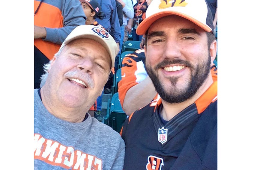 Dave Snook had a passion for football, and on occasion would travel to the U.S. for NFL action, including this 2015 game in Cincinnati with his son JD.