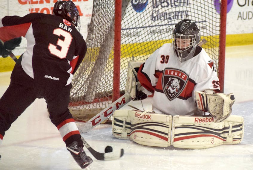 Truro Bearcats goaltender Mitchell Cook takes away the bottom part of the net from Daniel Bar of the Halifax Hawks during bantam AA action at the Mike Schmitt memorial hockey tournament on Thursday at the RECC. Halifax won the game 4-1.