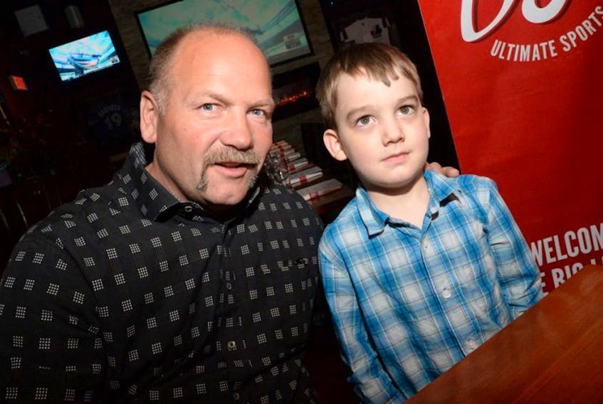 Former Toronto Maple Leafs captain Wendel Clark played in a golf tourney at Glendenning Golf in St. John’s on Tuesday and later was at The Bigs on Freshwater Road, where he signed autographs for fans, including four-year-old Lucas Pike.