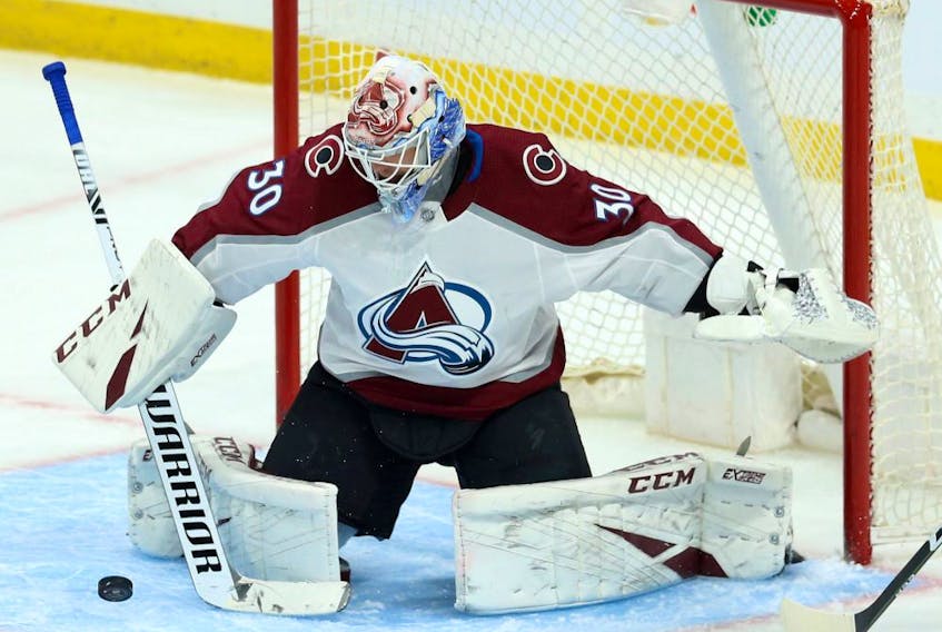 Colorado Avalanche goaltender Adam Werner makes a save on Tues., Nov. 12, 2019 in his NHL debut in Winnipeg. (KEVIN KING/Postmedia Network)