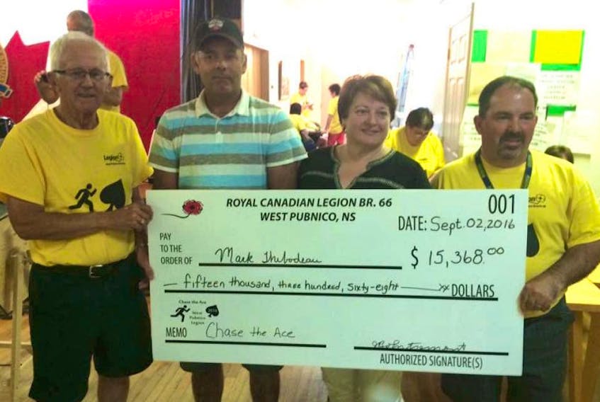 <p>West Pubnico Legion Chase the Ace committee members Jean Bernard d’Entremont, Charlene LeBlanc and Glenn Diggdon present the Sept. 2 Chase the Ace night’s winnings to Mark Thibodeau.</p>