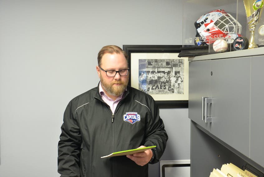Todd Richard, P.E.I. scout and governor for the Summerside Western Capitals, checks over notes for Saturday’s Maritime Junior Hockey League Draft.