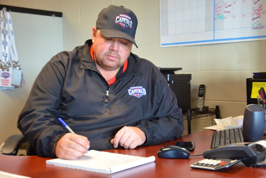 Summerside D. Alex MacDonald Ford Western Capitals general manager Pat McIver prepares for training camp in his office at Credit Union Place. The Maritime Junior Hockey League team holds its first official on-ice session today.