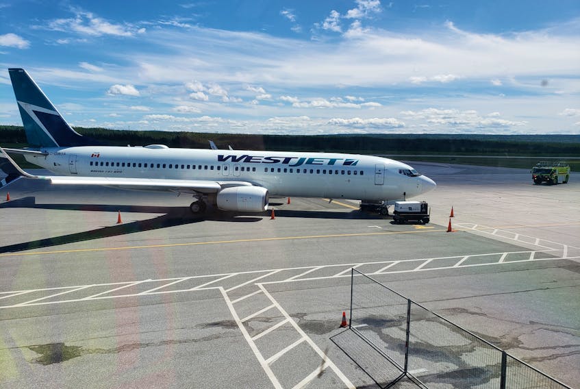 This Boeing 737-800 aircraft operated by WestJet landed safely at the Deer Lake Airport on Wednesday after declaring an emergency on approach to the airport.